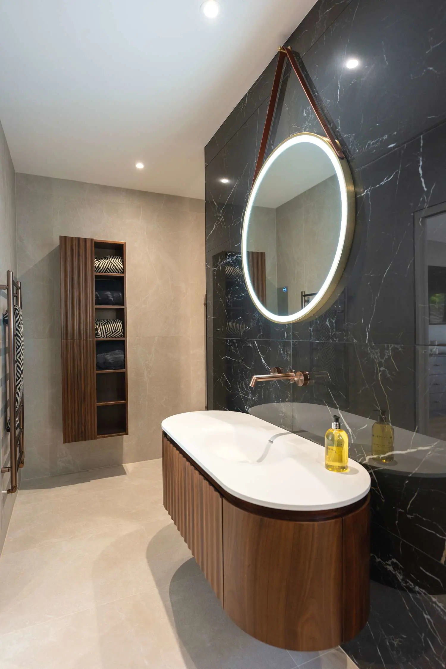 Bathroom finished in large format tiles.